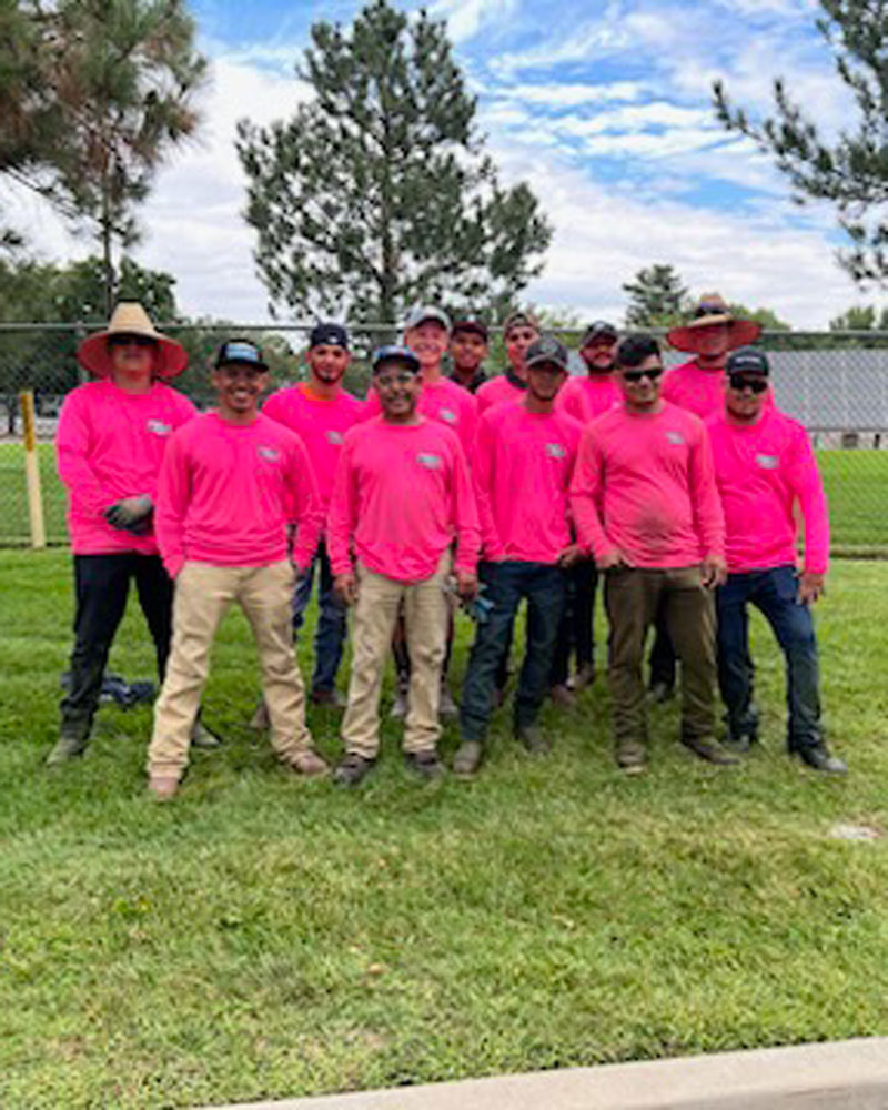 people wearing pink shirts